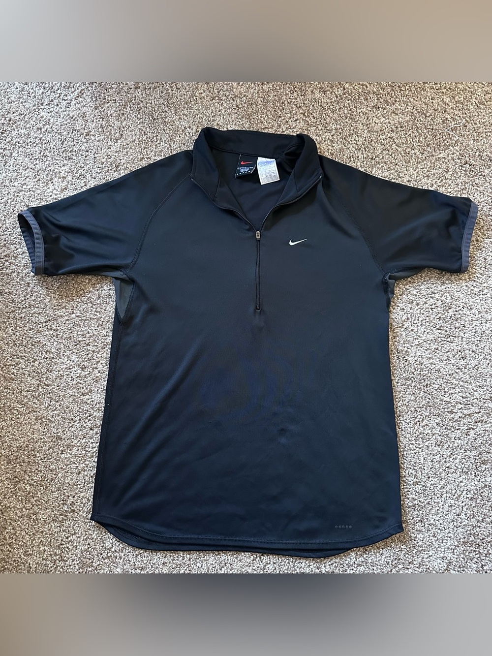 Nike Black Short-Sleeve Half-Zip Polo with White Swoosh
